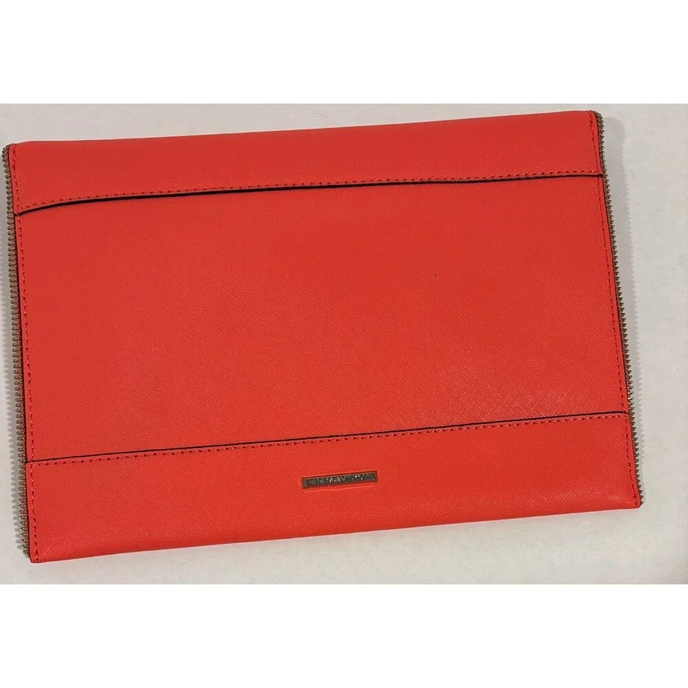 Rebecca Minkoff LEO envelope clutch leather color grapefruit zipper edge